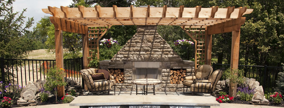 Wooden pergola surrounded by garden