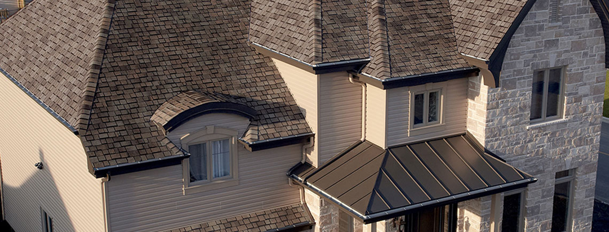 Metal roof installed on large brick house